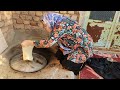 a village girl bakes local bread. how does a village girl bake bread alone in a wood fired oven