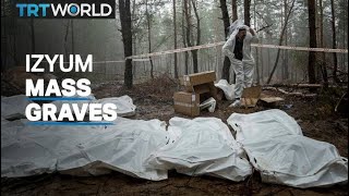 Ukraine accuses Russia of war crimes after mass graves found