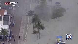 Waterspout hits Hollywood Beach, knocks over beachgoer