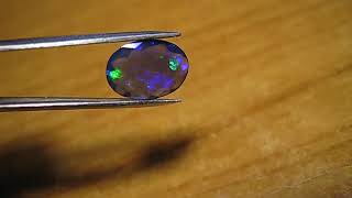 1.26ct Faceted Black Welo Opal AAA Natural Opal Neon Glitter Oval See Video