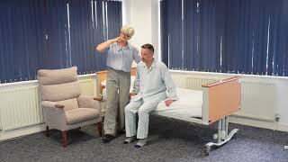 Assisting a Person to Stand From a Bed