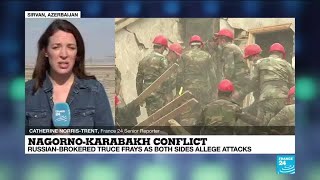 Nagorno-Karabakh: Armenia, Azerbaijan report attacks despite cease-fire deal