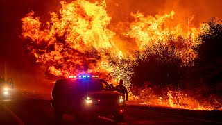 Wildfires rage across western US