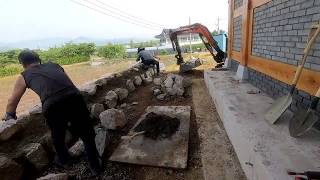 굴삭기 작업, 한옥주택 돌담쌓기..