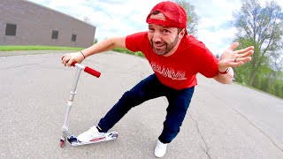 SKATEBOARDER TRIES TO SCOOTER!