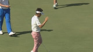 Hiroyuki Fujita pours in his 24-foot putt for birdie at Cadillac Championship