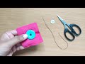 How to sew a four hole button by hand