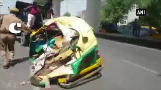 Auto rickshaw gets damaged after Metro construction materials fall on it