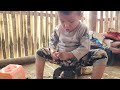 mother and son harvest vegetables to sell and prepare to build a barn for raising livestock