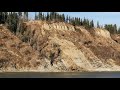 close up look man living in steep river bank slope