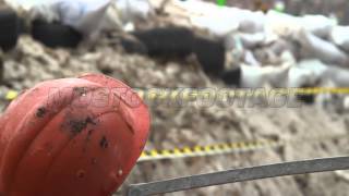 Construction hard hat barricades of snow tyres barbed wires. Stock Footage