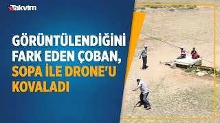 Yaylada görüntülendiğini fark eden çoban, sopa ile drone'u böyle kovaladı