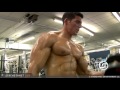 robert t warms up biceps with light dumbbell curls