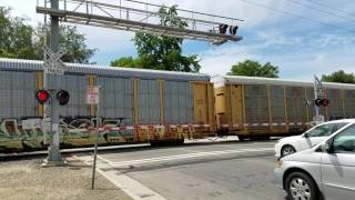 BNSF 6746 Manifest Northbound With Slow Order and Sacramento Light Rail, W Street, Sacramento CA