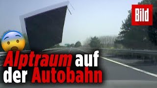 Containerdach löst sich von LKW und kracht auf dahinter fahrendes Auto