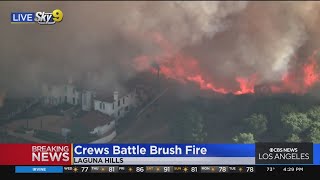 A fire in Laguna Hills threatens a multi-million dollar home