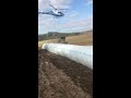 pipeline hydro seeding helicopter fill up.