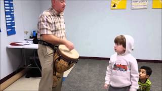 Kindermusik kids learn the djembe drum