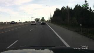 Car cutting across 2 lanes almost hits car.