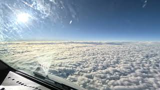 Boeing 767-300F cruising flight at FL380 above the clouds