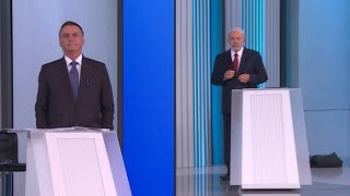 O último debate entre Lula e Bolsonaro | AFP