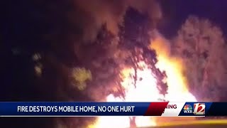 2 escapes massive mobile home fire in Davie County