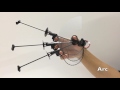 Wolverine: A Wearable Haptic Interface for Grasping in VR