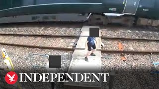 Shocking CCTV footage shows children playing on train tracks in Oxfordshire