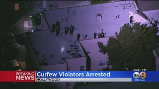 Police Arrest Hollywood Protestors From Apartment Building Roof For Curfew Violation