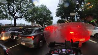 Riding Through the Chaos: A Motorcycle Journey Across São Paulo's Rainy Streets and Heavy Traffic