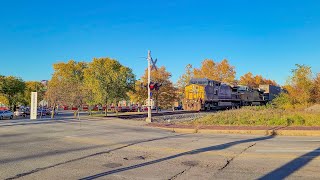 YN2 dash 8 with old steel bell leads CSX mixed freight/intermodal train