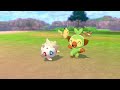 Togepi and Grookey play together in the Wild area