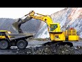 Komatsu PC2000-8 Top Loading HD785-7's