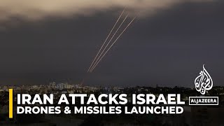 Iran launches hundreds of missiles, drones in first direct attack on Israel