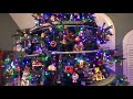 bonkers snow village with lionel train in tree