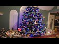 bonkers snow village with lionel train in tree