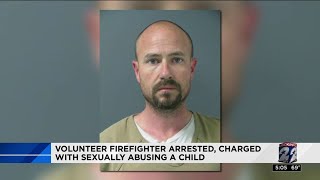 Volunteer firefighter arrested, charged with sexually abusing a child