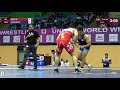 Qual. FS - 97 kg: S. AZIZI (IRI) v. K. YOSHIDA (JPN)