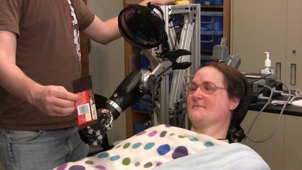 One Giant Bite: Woman With Quadriplegia Feeds Herself Chocolate Using ...