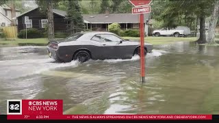 Roads, backyards submerged after heavy rainfall in Suffolk County