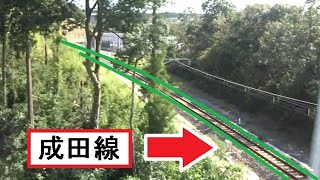 ほんの一瞬だけ成田線との立体交差が見える成田湯川駅に到着する成田スカイアクセス線上り9800形の車窓