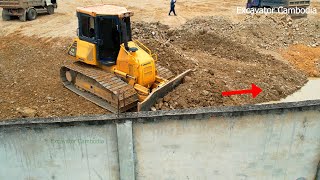 Epic 10 D61PX Dozer Pushing Back Fill In Fence And Good Team Working Dump Truck Dumping Stone Soil