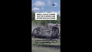 Small child climbs out of flipped car after police chase