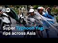 Several dead, tens of thousands evacuated as the most powerful storm in decades hits Asia | DW News