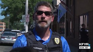 Lt. Luke Gardiner talks threat at Bravera Bank in downtown Bismarck