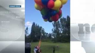 Up in the air: Calgary man soars in lawn chair attached to helium balloons