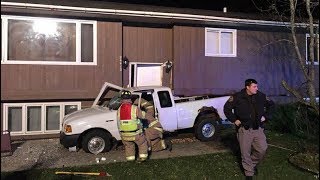 Accused drunken driver crashes into home; had previous drunken driving arrest