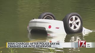 Man charged after crashing car in Wake Forest Reservoir