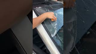 Oil film cleaning of automobile glass.