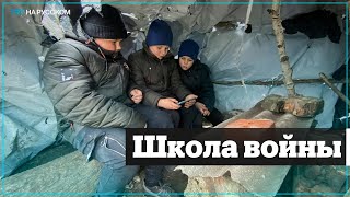 Палатка в поле заменила школу в освобожденном селе в Украине